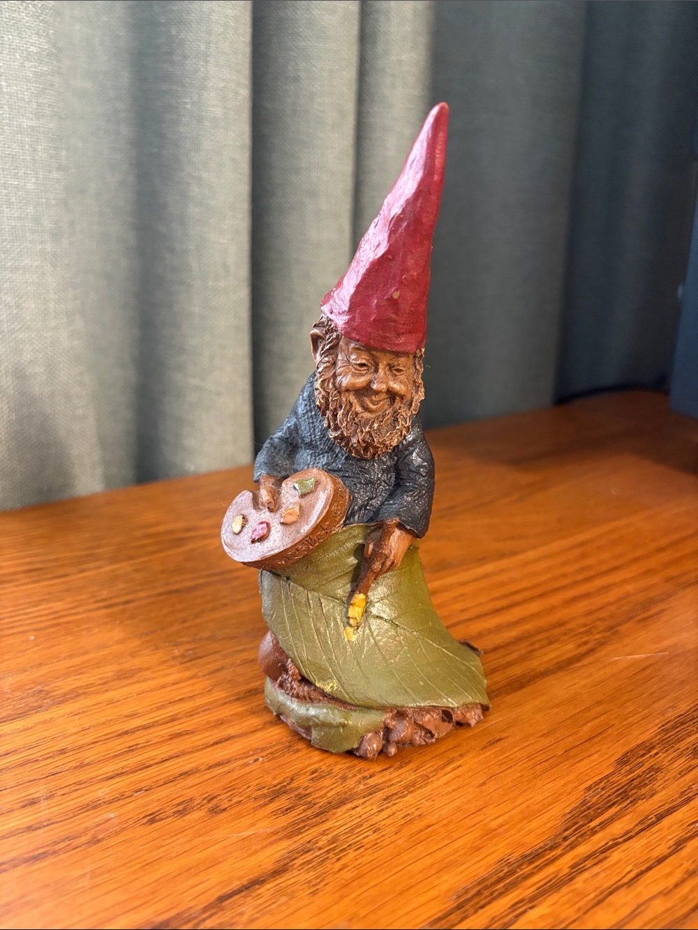 Whimsical Red-Hat Garden Gnome Sculpture in Green Leaf